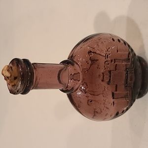 Vintage tiny plum New York bottle